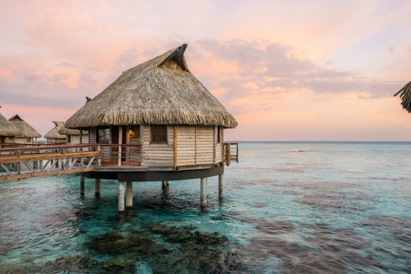 Le Tikehau by Pearl Resorts - Overwater bungalow sunset