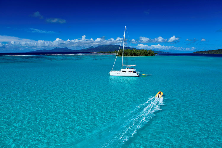 Sailing over the Raromatai Crystal-clear Waters - Tahiti Yacht Charter