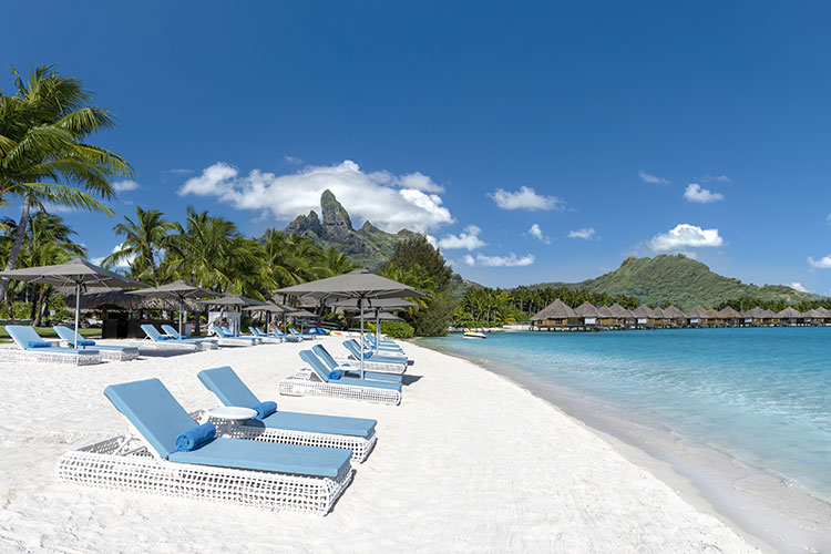 Sailing over the Raromatai Crystal-clear Waters - St Regis Bora Bora